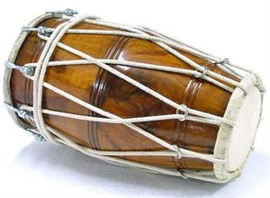 Dholak_dhol_drum,_one_of_many_percussion_instruments_of_South_Asia.jpg